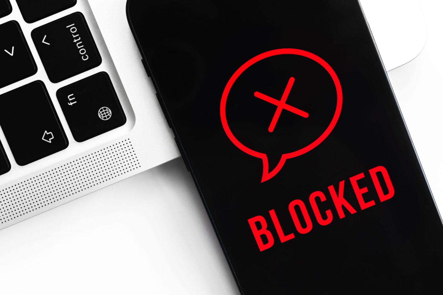 blocked-messages-concept-mobile-phone-privacy-background-black-screen-with-icon-text-modern-technologies-scaled.jpg