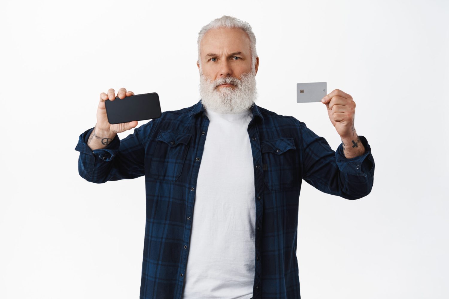 serious-mature-bearded-man-showing-mobile-phone-screen-credit-card-showing-something-smartphone-display-standing-white-background-copy-space-scaled.jpg